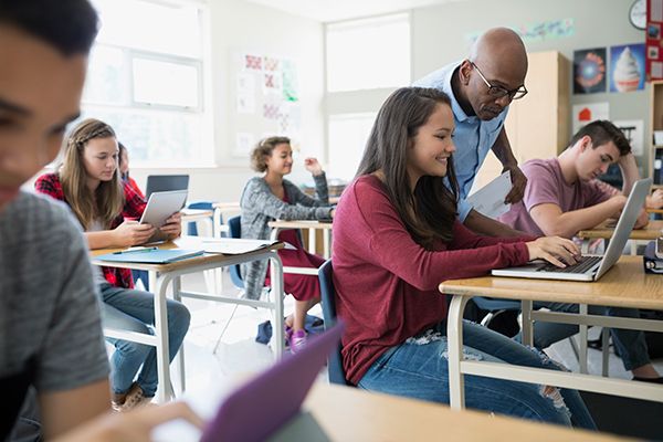 All Star Educator Helping Student