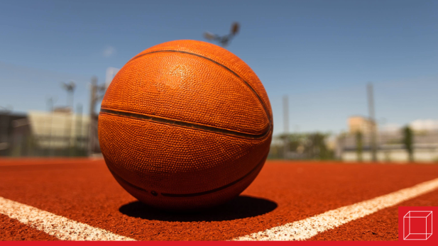 Basketball on orange court