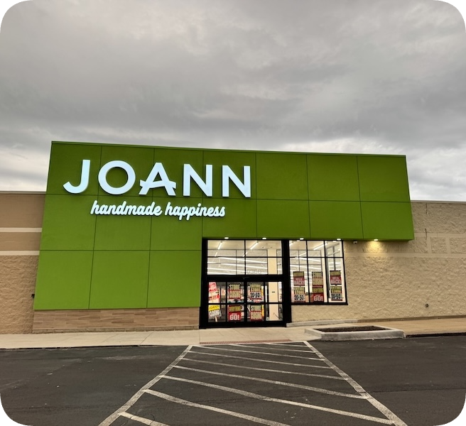 Joann fabric store with "handmade happiness" slogan 