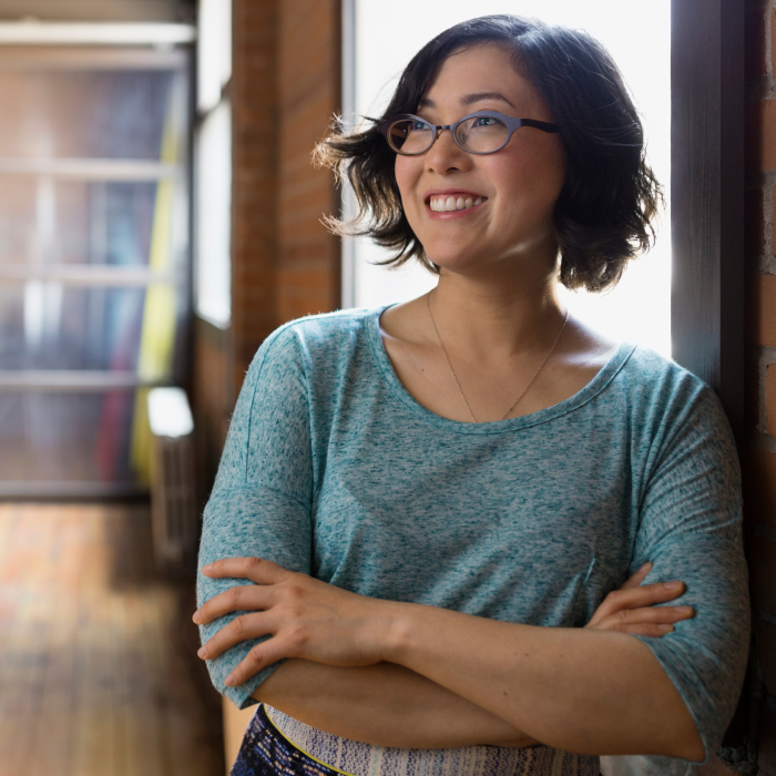 woman standing in library