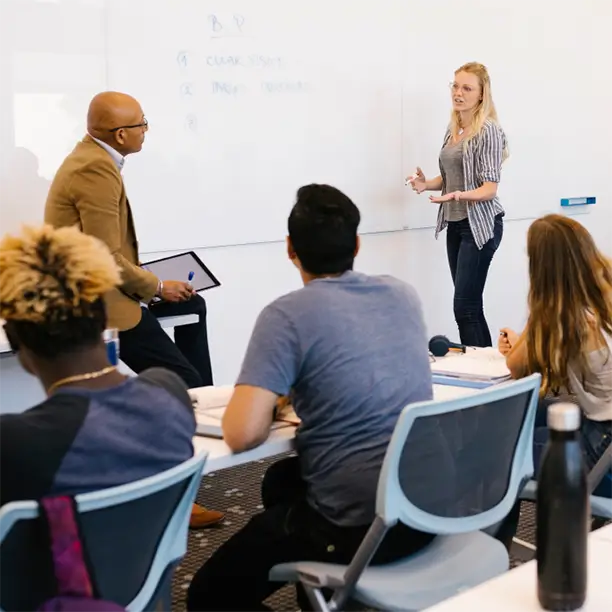 classroom with teacher and students