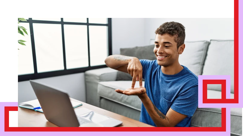 Male student in front of laptop.