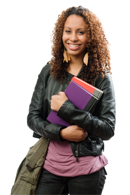 Smiling student holding books.