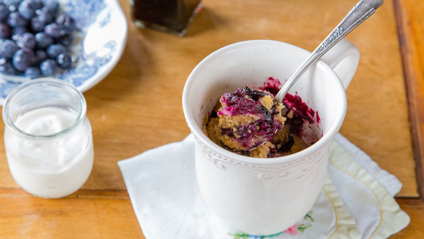 Blueberry Muffin in a mug with a spoon