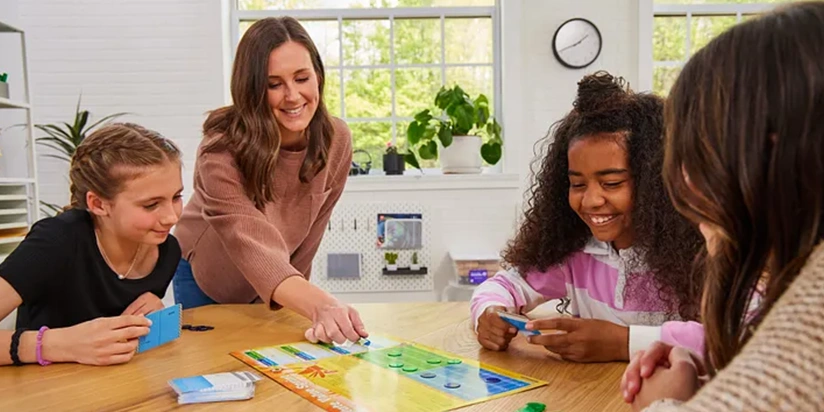teacher playing games with students