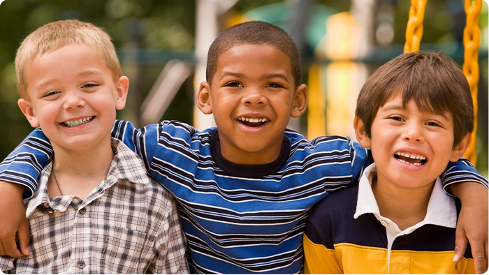 Three smiling children.