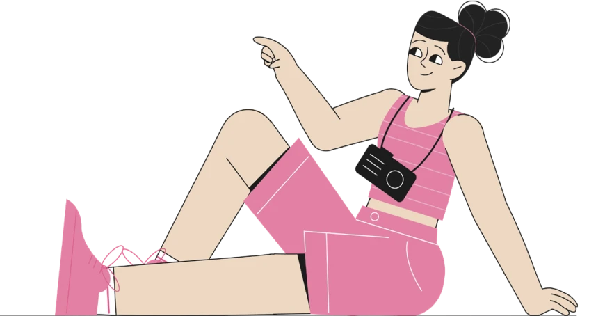 An illustrated woman seated on the ground wearing a bun, in a pink top and pink shorts with a camera around her neck pointing to her right